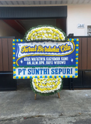 Papan Bunga Duka di Ujung